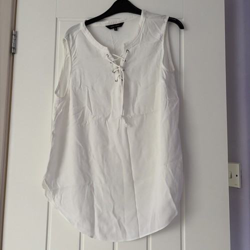 Top bianco senza maniche